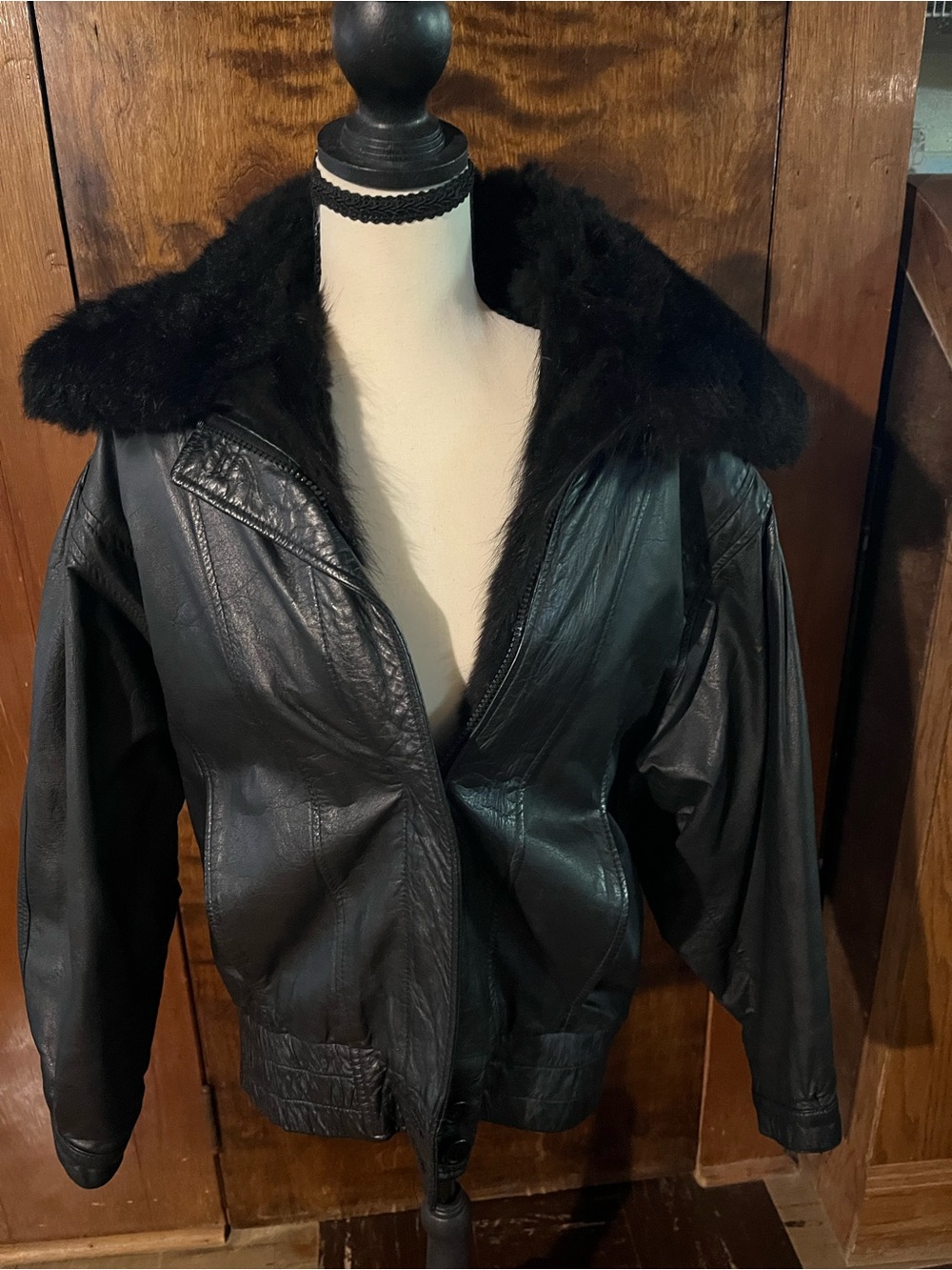 Black Leather Bomber Jacket - Women. Has zip out fur lining